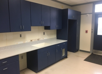 New cabinetry, Corian countertops and an integrated Corian bowl were fabricated in-house and installed for Canine Partners For Life in Cochranville, PA. We also replaced damaged cabinet doors and drawer heads in the grooming room. The kitchen received a full renovation.