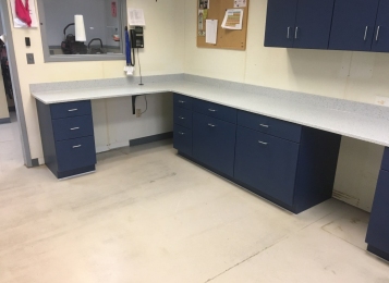 New cabinetry, Corian countertops and an integrated Corian bowl were fabricated in-house and installed for Canine Partners For Life in Cochranville, PA. We also replaced damaged cabinet doors and drawer heads in the grooming room. The kitchen received a full renovation.
