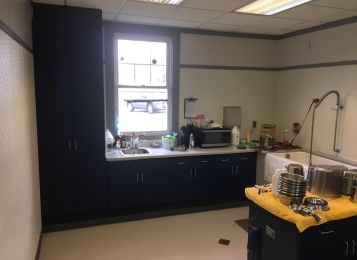 New cabinetry, Corian countertops and an integrated Corian bowl were fabricated in-house and installed for Canine Partners For Life in Cochranville, PA. We also replaced damaged cabinet doors and drawer heads in the grooming room. The kitchen received a full renovation.