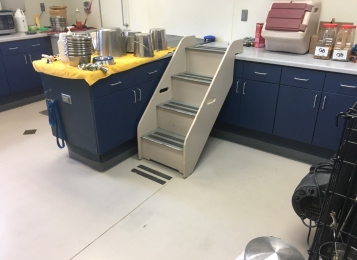 New cabinetry, Corian countertops and an integrated Corian bowl were fabricated in-house and installed for Canine Partners For Life in Cochranville, PA. We also replaced damaged cabinet doors and drawer heads in the grooming room. The kitchen received a full renovation.