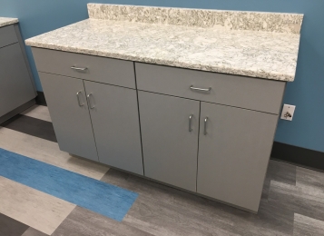 Commercial kitchen at Cambria quartz tops of plywood construction three mill edge on all doors in your head. Undermount stainless steel sink. Industrial facility in Delaware! Kitchenette for employees!