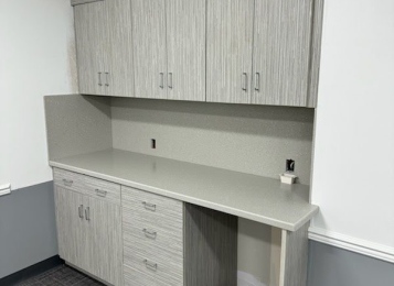 Custom made laminate cabinetry for a doctor