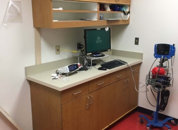 Custom-made cabinets Corey on top for a doctors exam