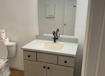 Pewter 36" vanity with Custom made Corian Top-with integral Corian Bowl with a two week lead time. For a furniture store in Oxford PA!