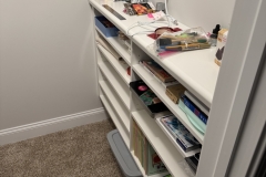 Custom closet art station with shelving – wooden tops with conversion varnish applied.